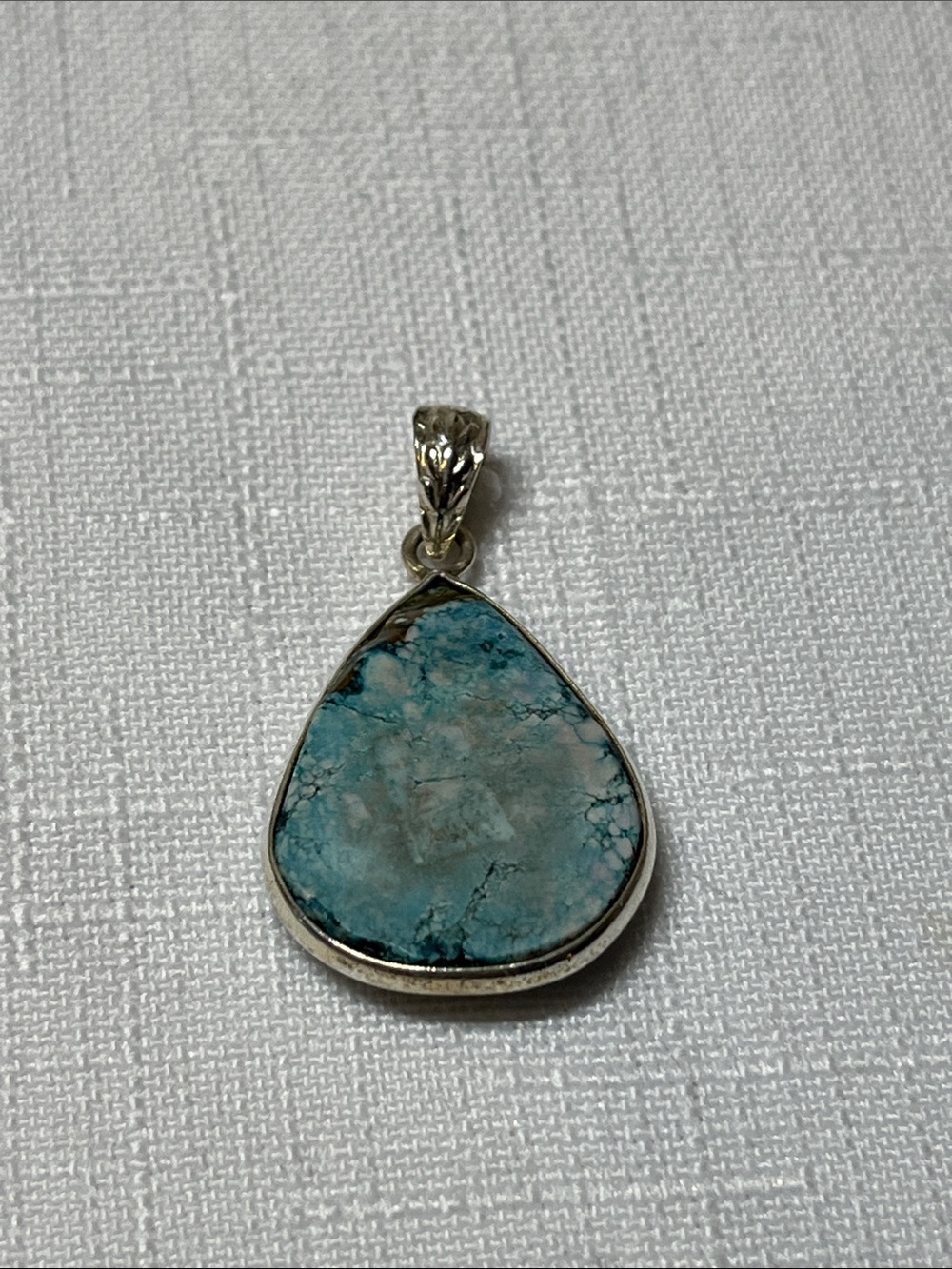 Blue Teardrop Pendant in Sterling Silver Setting
